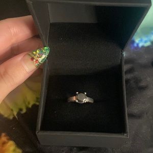 2carat Black natural diamond. Has some chips. Price reflects. In sv